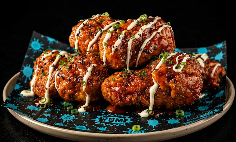 Hot Honey Sriracha Wings Sweet. Sticky. Dangerous. Hot honey meets sriracha heat for a glaze that hits hard and keeps coming back. What's on it? Honey toss, sriracha powder, sriracha drizzle, lime and chives.